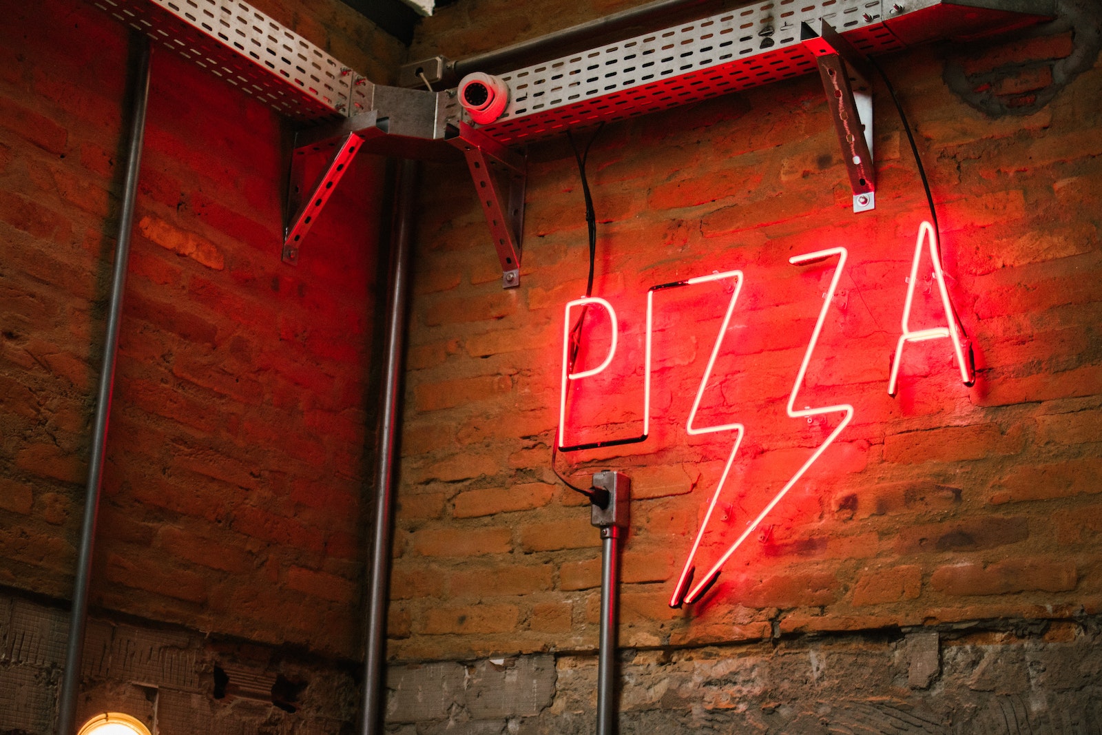 Photo by Athena Red Pizza Neon Signage